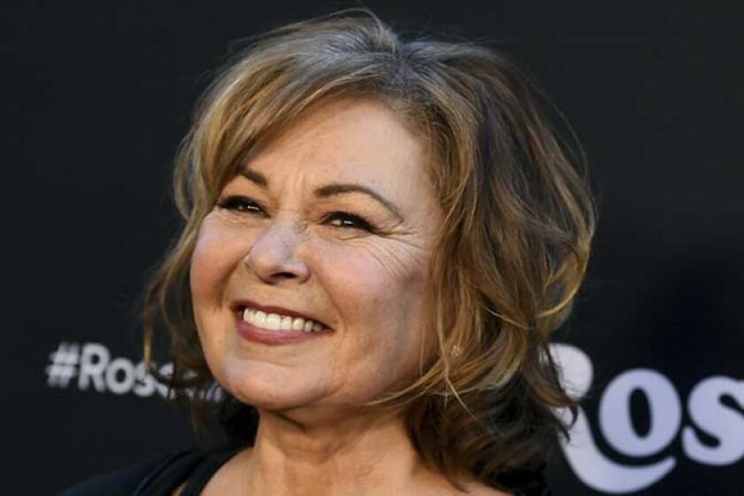 FILE - In this March 23, 2018, file photo, Roseanne Barr arrives at the Los Angeles premiere of "Roseanne" on Friday in Burbank, Calif. Barr has apologized for suggesting that former White House adviser Valerie Jarrett is a product of the Muslim Brotherhood and the Ã¢â¬ÅPlanet of the Apes.Ã¢â¬Â Barr on Tuesday, May 29, tweeted that she was sorry to Jarrett Ã¢â¬Åfor making a bad joke about her politics and her looks.Ã¢â¬Â Jarrett, who is African-American, advised Barack and Michelle Obama. (Photo by Jordan Strauss/Invision/AP, File)