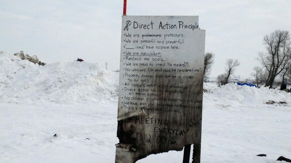 A sign Wednesday at an encampment near Cannon Ball, N.D., of opponents of the Dakota Access pipeline.