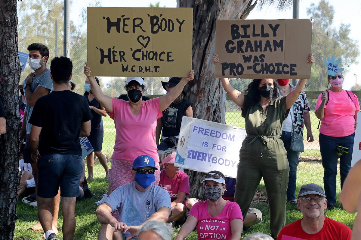 The demonstration at Mile Square Park in Fountain Valley was one of several in Orange County on Saturday.