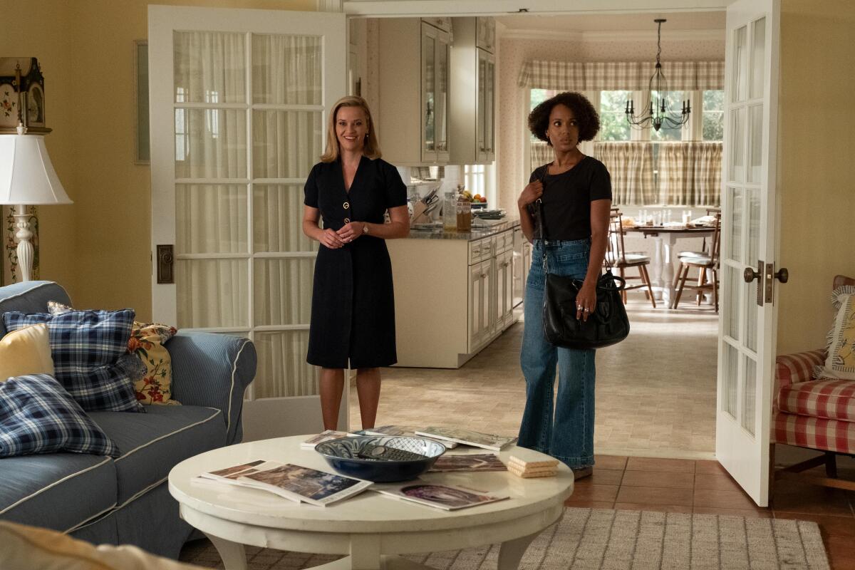 Reese Witherspoon, left, and Kerry Washington in a scene from "Little Fires Everywhere."