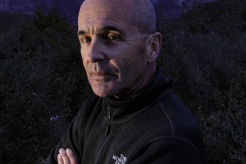 JULIAN,CA., FEB 1, 2019: Thriller/crime novelist Don Winslow stands on a hilltop in San Diego County overlooking a portion of the Borrego Valley where people and drugs coming from Mexico intersect on the desert floor below him February 1, 2019. Winslow?s new book, "The Border" comes out in February. The novel is the third in a sweeping trilogy of America's drug wars (Mark Boster For the LA Times).