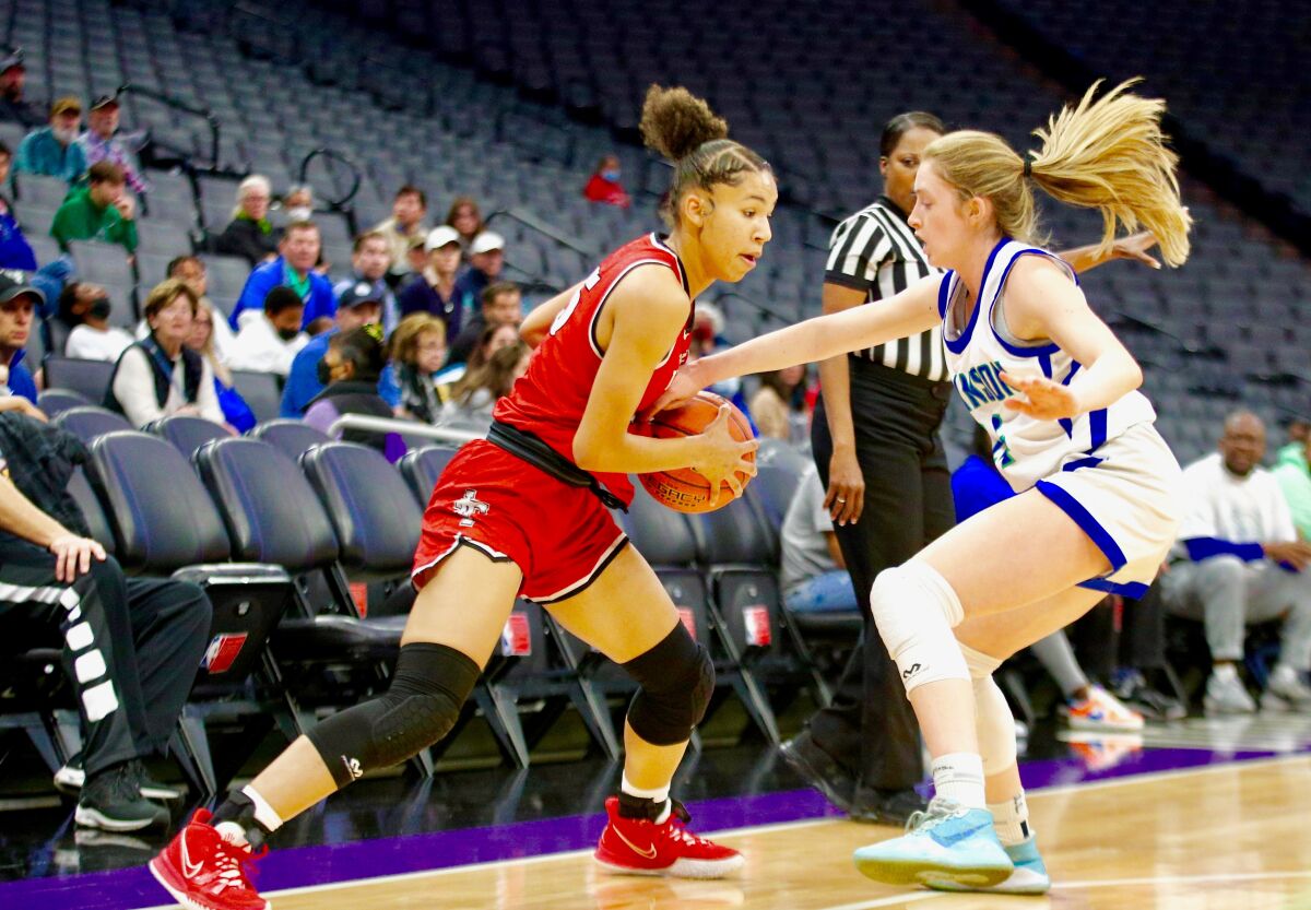Imperial forward Sierra Morris guarded by Branson’s Georgia Oliver in second quarter of Saturday's state championship game.