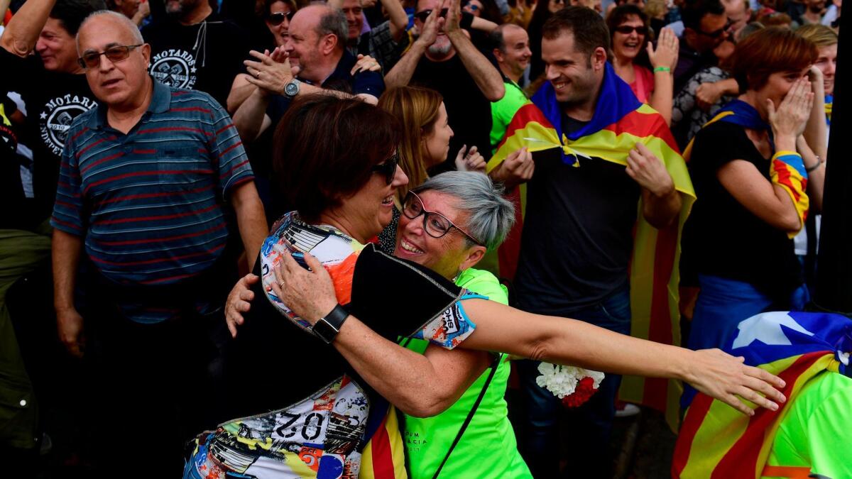 People in Barcelona celebrate after Catalonia's parliament voted Oct. 27 to declare independence from Spain.