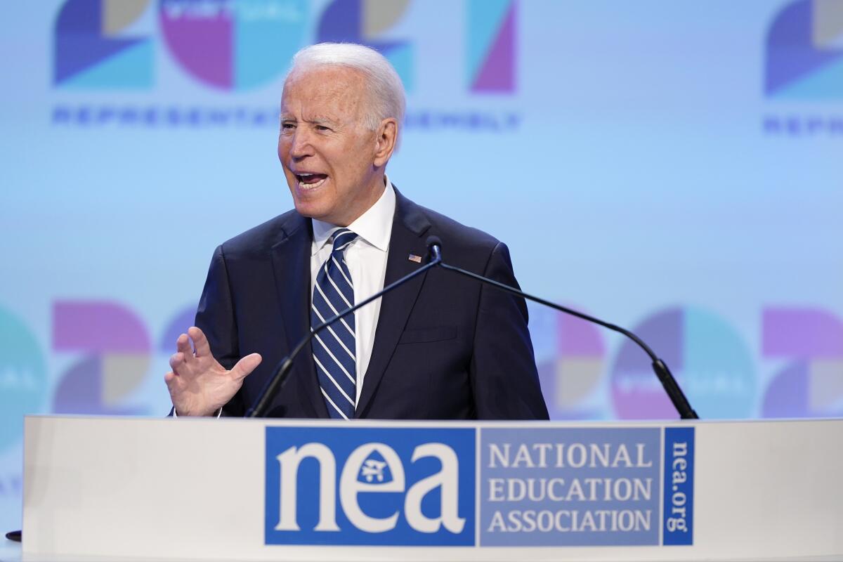 President Joe Biden speaks at the National Education Association's annual meeting at the Walter E. Washington Convention Center in Washington, Friday, July 2, 2021. (AP Photo/Patrick Semansky)