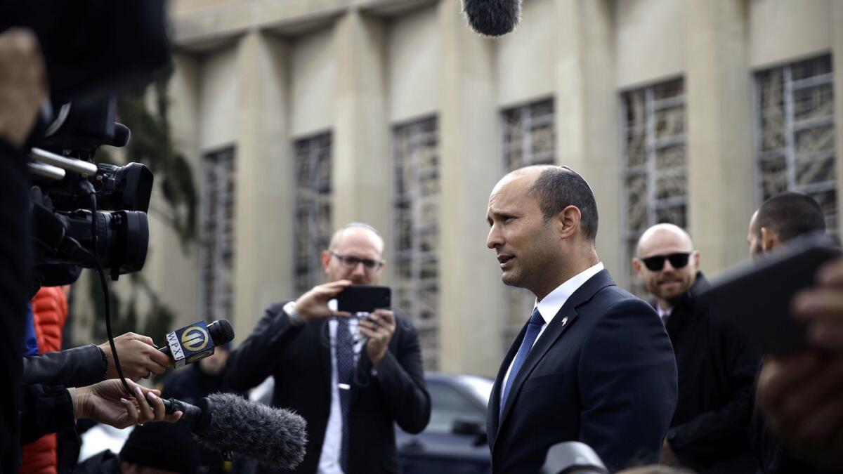 Israel's Diaspora Affairs Minister Naftali Bennett speaks to the media near the Tree of Life Synagogue in Pittsburgh on Oct. 28, 2018.