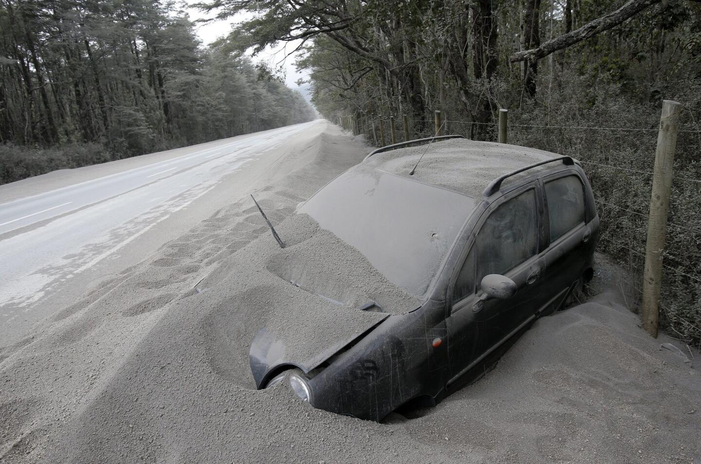 A vehicle near Ensenada in southern Chile is covered with ashes after the eruption of the Calbuco volcano.
