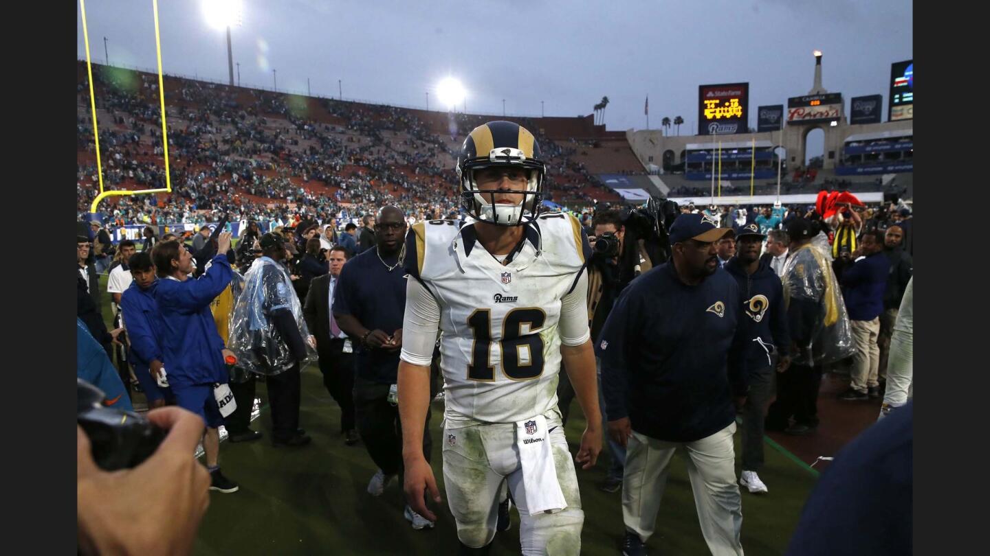 Rams quarterback Jared Goff leaves the field after a 14-10 defeat to the Dolphins in his first start as a pro.