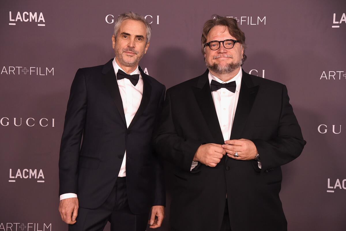 Directors Alfonso Cuarón y Guillermo del Toro en Los Ángeles.