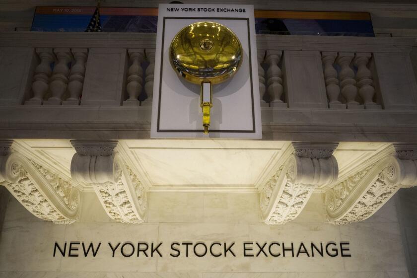 FILE- In this May 10, 2018, file photo the opening bell hangs above the trading floor at the New York Stock Exchange. The U.S. stock market opens at 9:30 a.m. EDT on Friday, Aug 10. (AP Photo/Mark Lennihan, File)