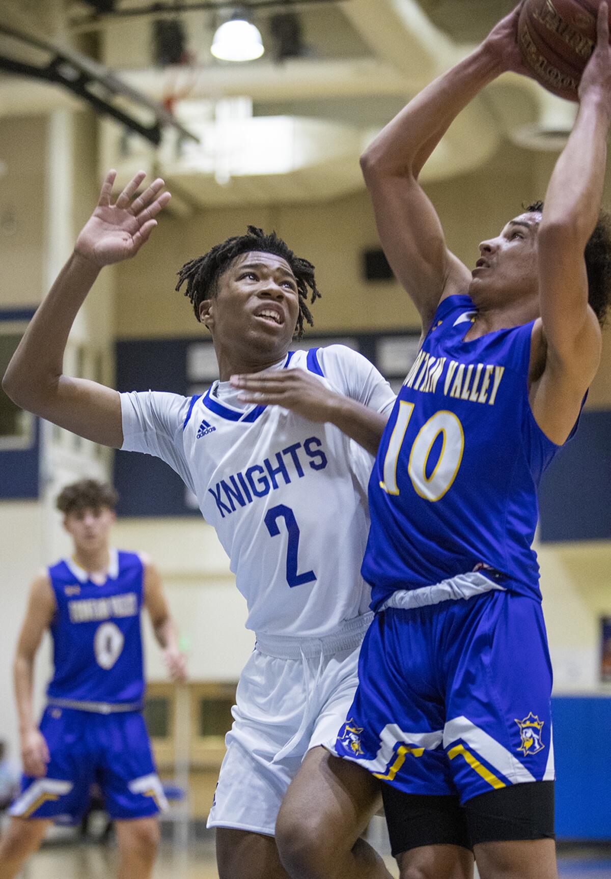 Fountain Valley's Roddie Anderson goes up for a shot against Price's Yahsani Humphreys during the quarterfinals of the CIF State Southern California Regional Division III playoffs on Thursday.
