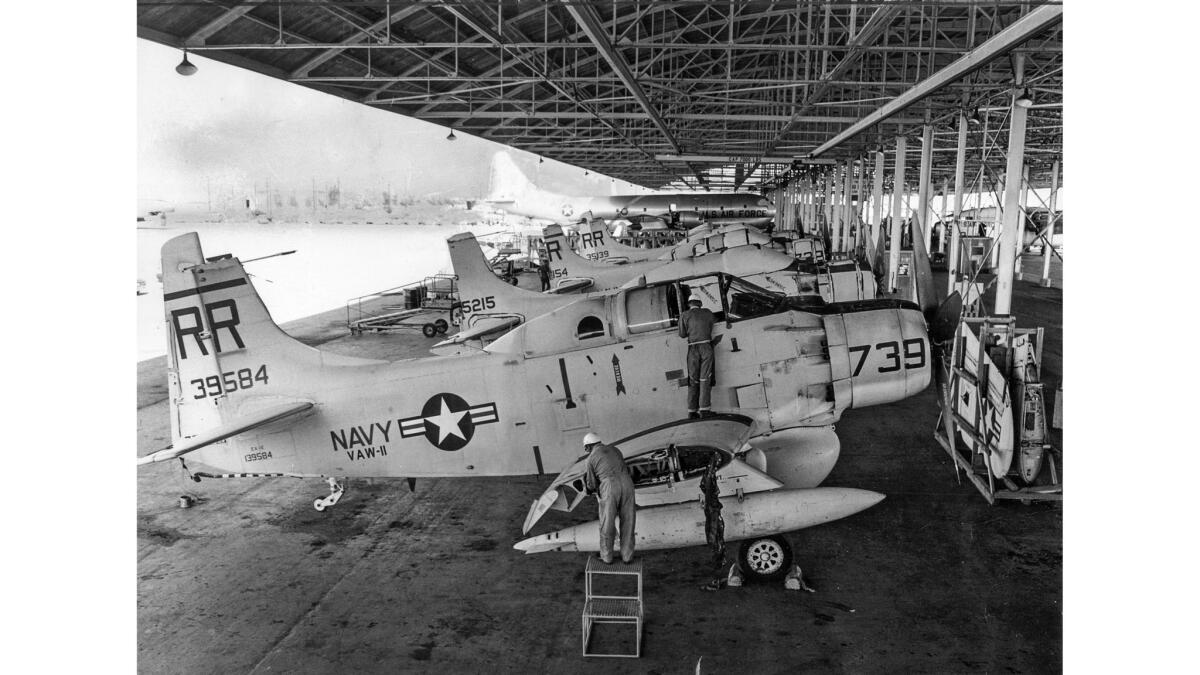 March 22, 1967: Early 1950s era Navy A-1 Skyraiders are rebuilt at Davis-Monthan Air Force Base in Tucson for use in Vietnam. This photo appeared in the Los Angeles Times on April 30, 1967.