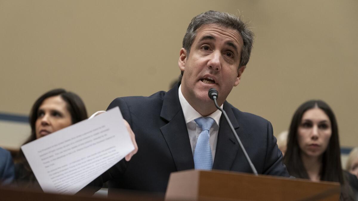 Michael Cohen reads an opening statement as he testifies before Congress on Feb. 27.