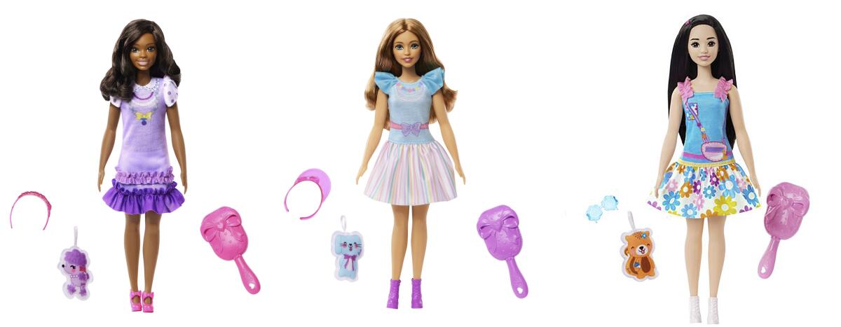 Three dolls and their toy accessories are shown. 