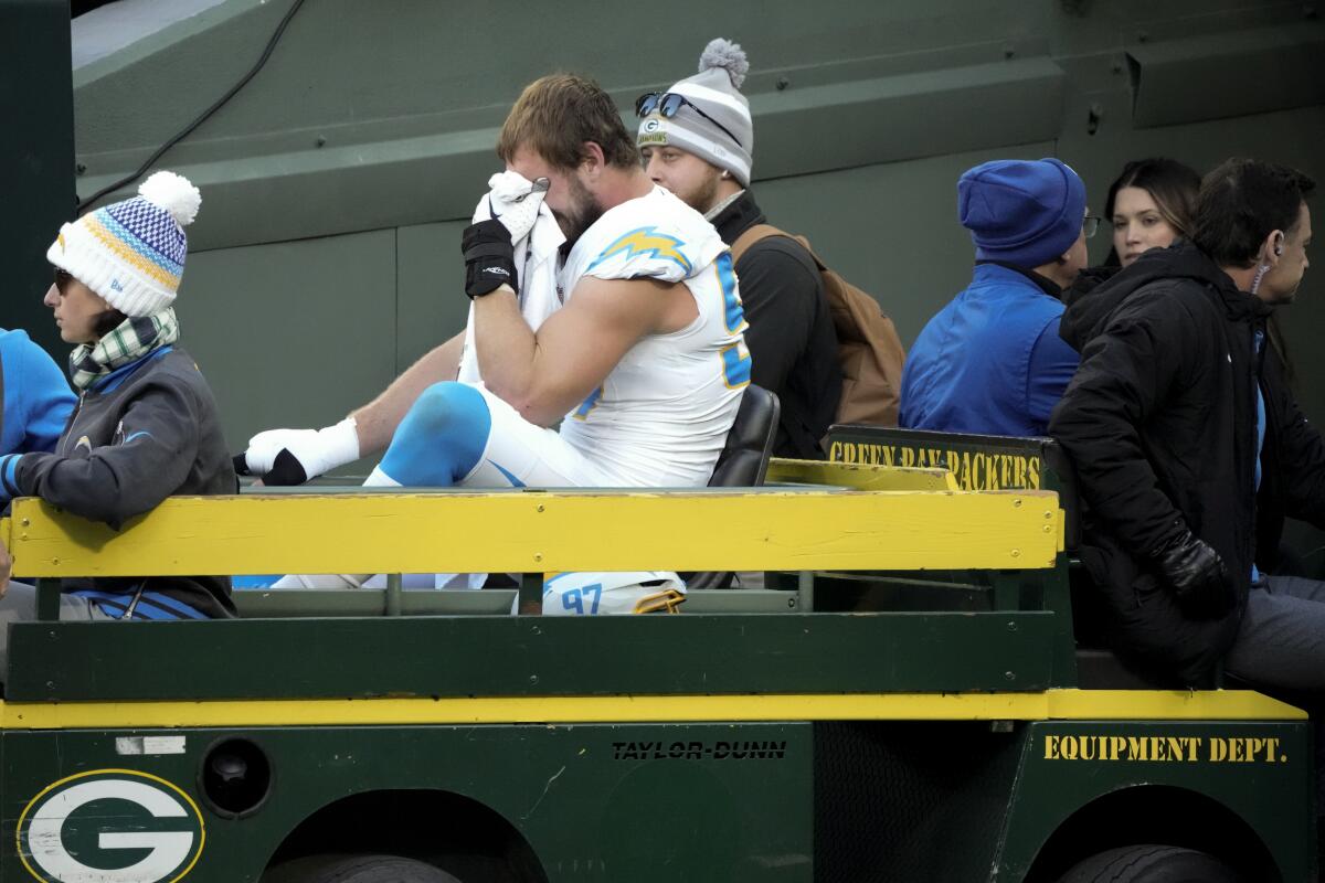 Chargers linebacker Joey Bosa was taken off the field by cart after injuring his right foot.