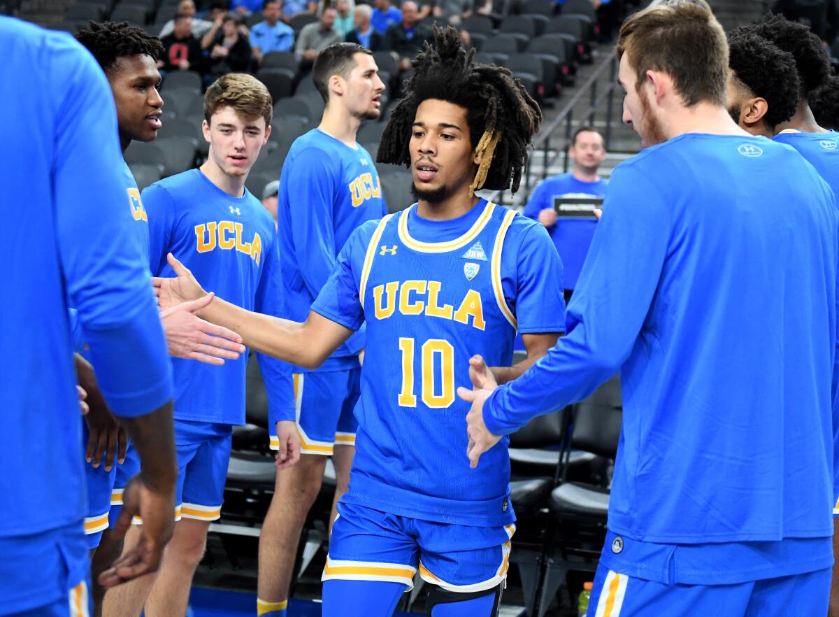 UCLA guard Tyger Campbell is introduced before a game against the North Carolina at on Dec. 21 at the CBS Sports Classic at T-Mobile Arena.