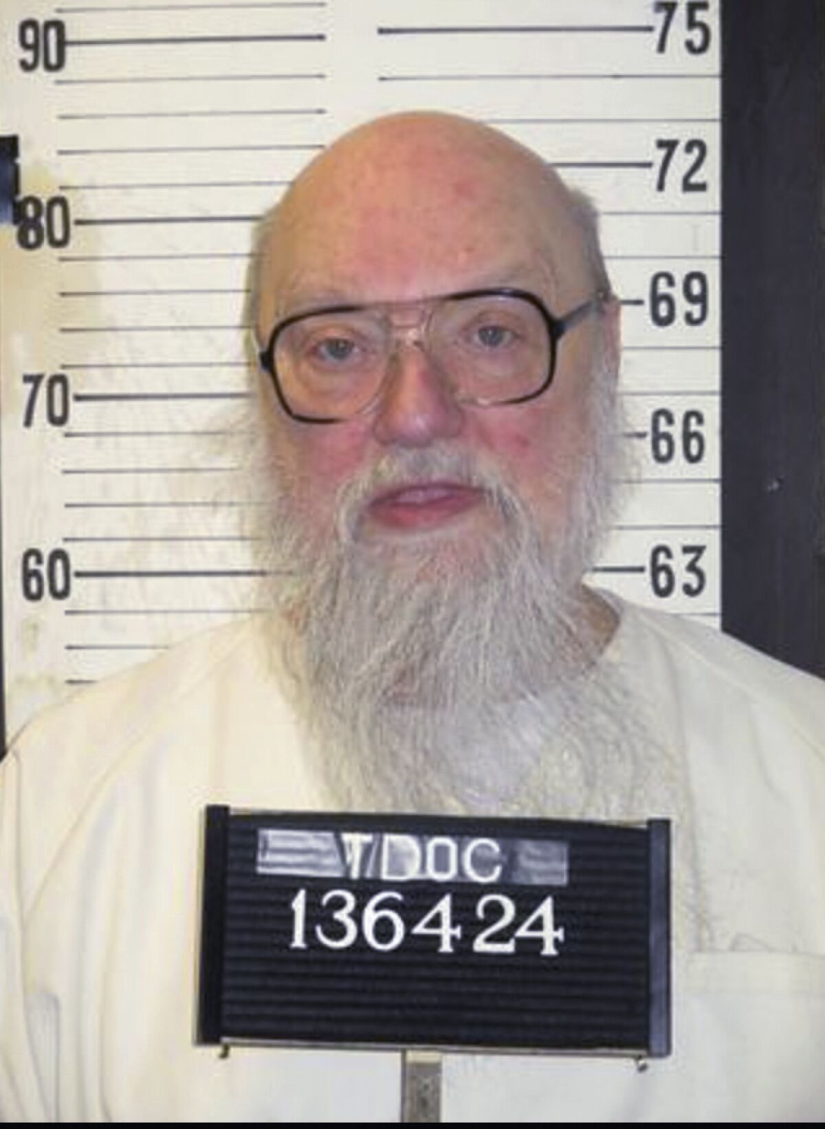 A photo provided by the Tennessee Department of Correction, date not known, shows inmate Oscar Smith. Smith, a Tennessee inmate scheduled to be executed April 2022, is asking the courts to reopen his case after DNA from an unknown person was detected on one of the murder weapons. Smith is scheduled to die by lethal injection on April 21. He was convicted in 1990 of fatally stabbing and shooting his estranged wife, Judith Smith, and her two teenage sons, Jason and Chad Burnett. (Tennessee Department of Correction via AP)