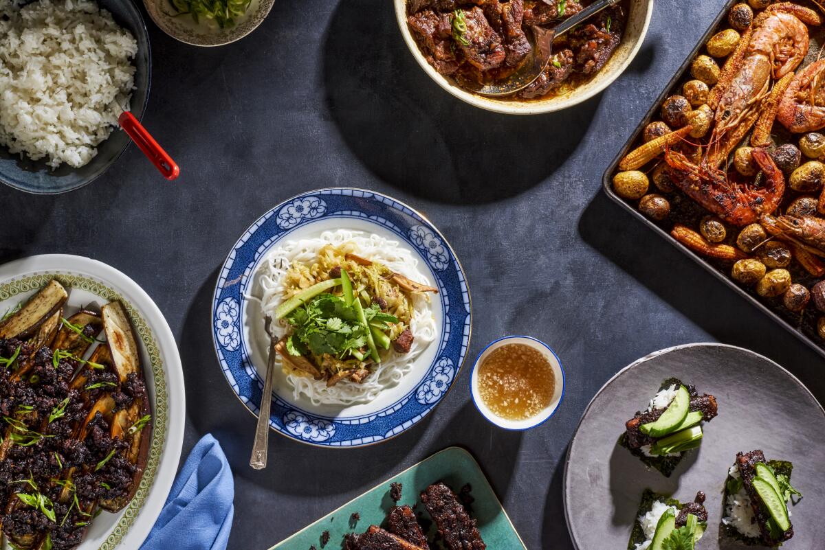 An overhead view of a variety of food on plates.