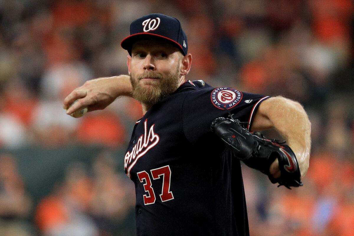 Washington Nationals starter Stephen Strasburg delivers a pitch during Game 2 of the World Series.