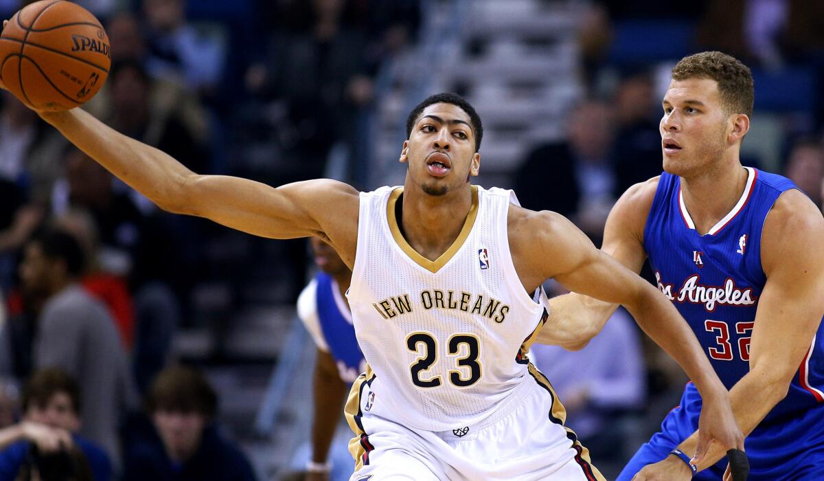 Pelicans forward Anthony Davis (23), working in the post against Clippers All-Star Blake Griffin, has quickly become one of the best players in the NBA.