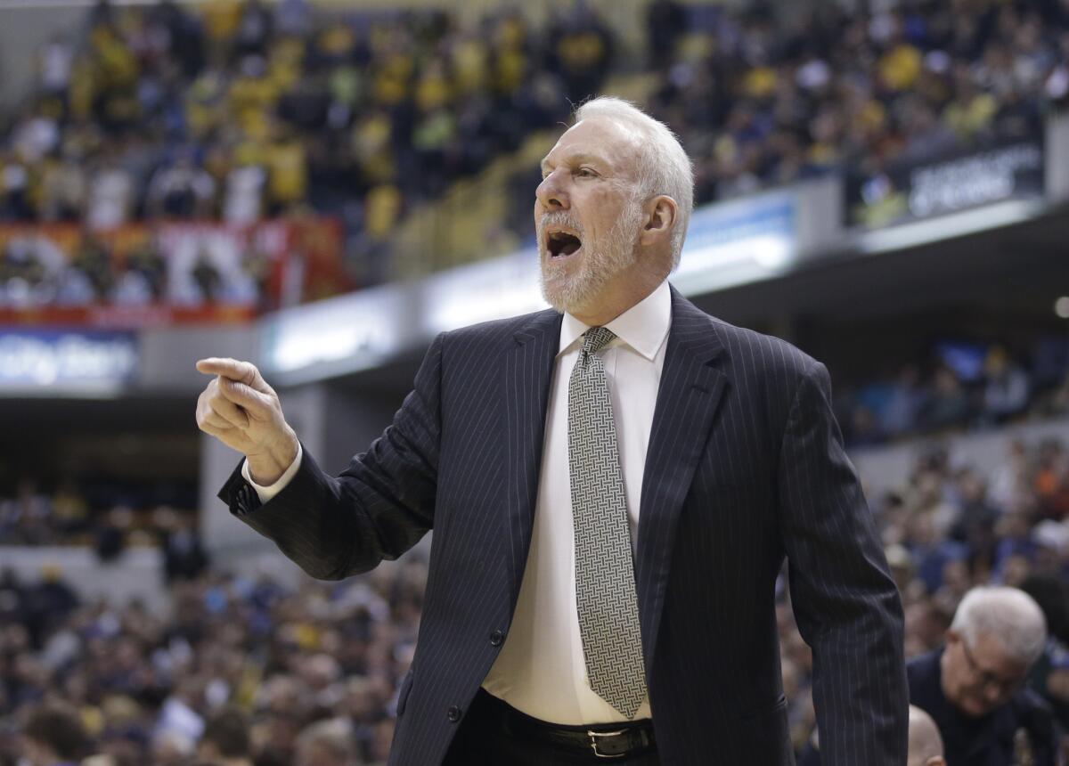Spurs Coach Gregg Popovich yells instruction in the first half of the Spurs' victory at Indiana.