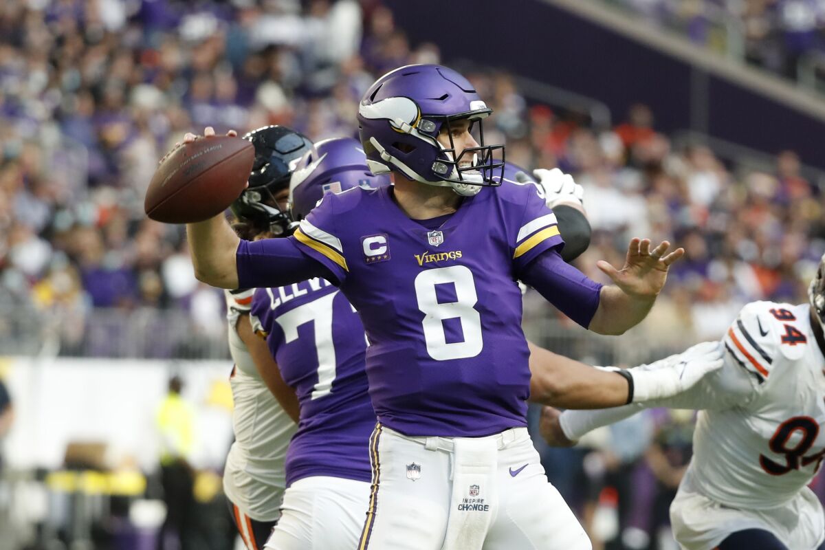 Minnesota Vikings quarterback Kirk Cousins throws a pass against the Chicago Bears.
