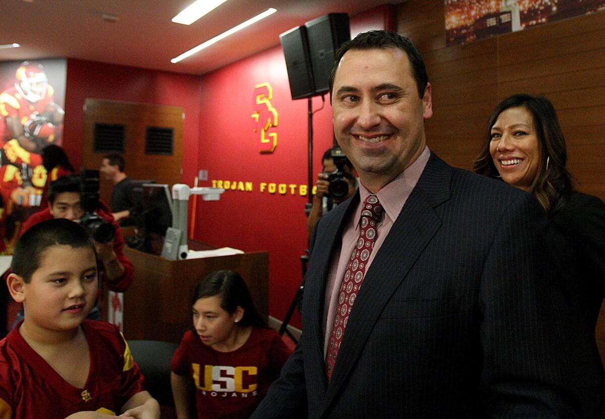 USC Coach Steve Sarkisian smiles during his introductory news conference on Tuesday.