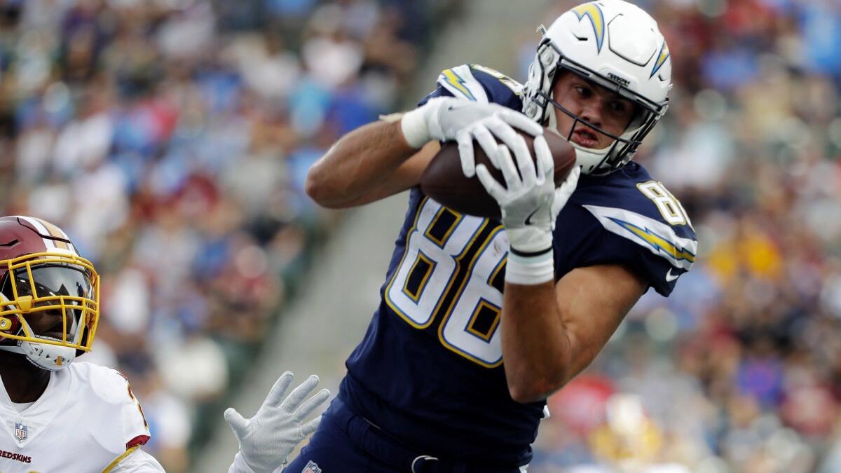 Chargers tight end Hunter Henry makes a touchdown catch during a game against the Washington Redskins in December 2017.
