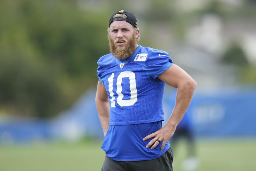 Los Angeles Rams wide receiver Cooper Kupp (10) participates in the NFL football team's organized activities Tuesday, June 6, 2023, in Thousand Oaks, Calif. (AP Photo/Ashley Landis)