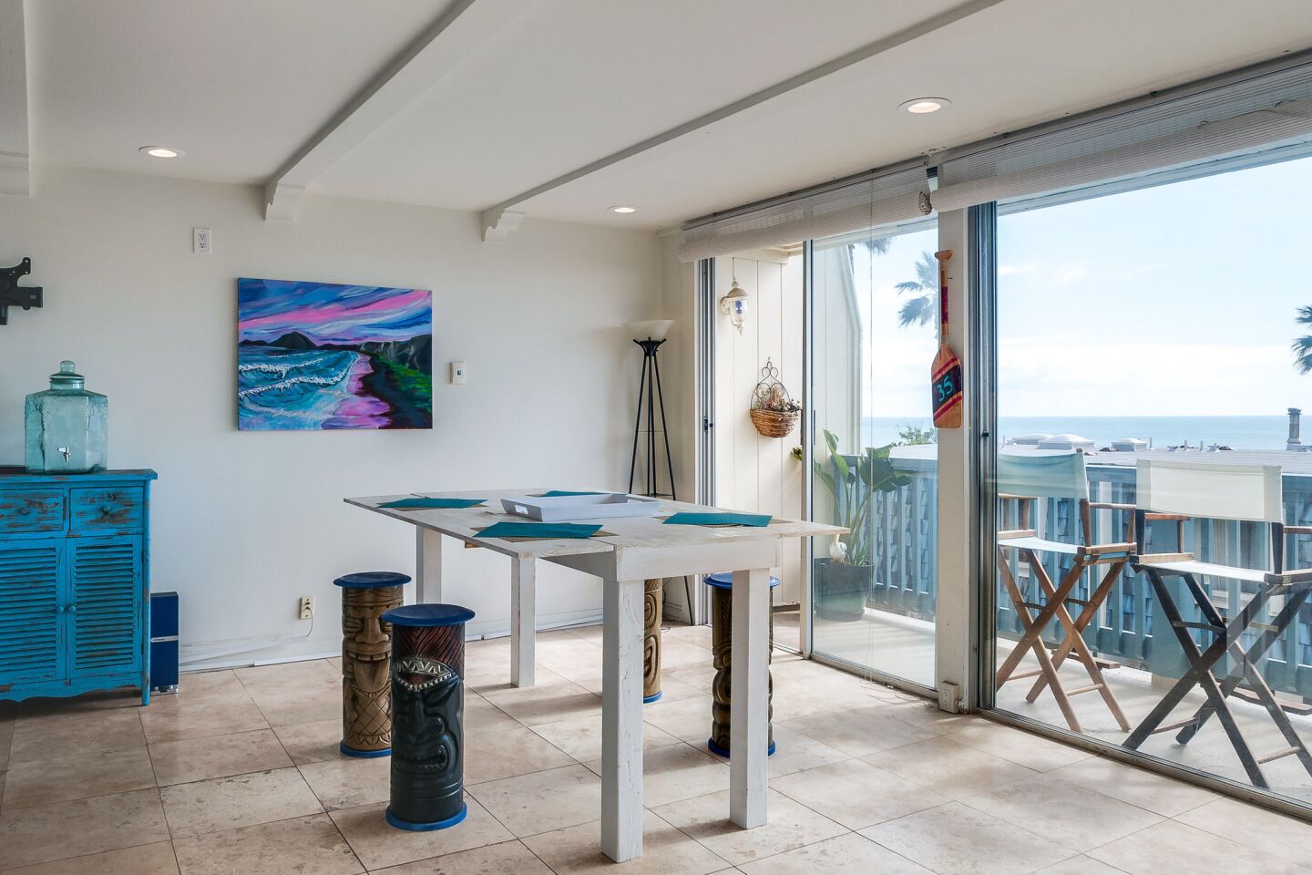 The two-story condo in Malibu takes in panoramic ocean views.