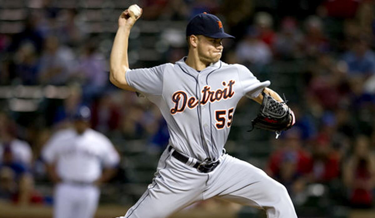 Reliever Chad Smith delivers a pitch while pitching for the Tigers last season.