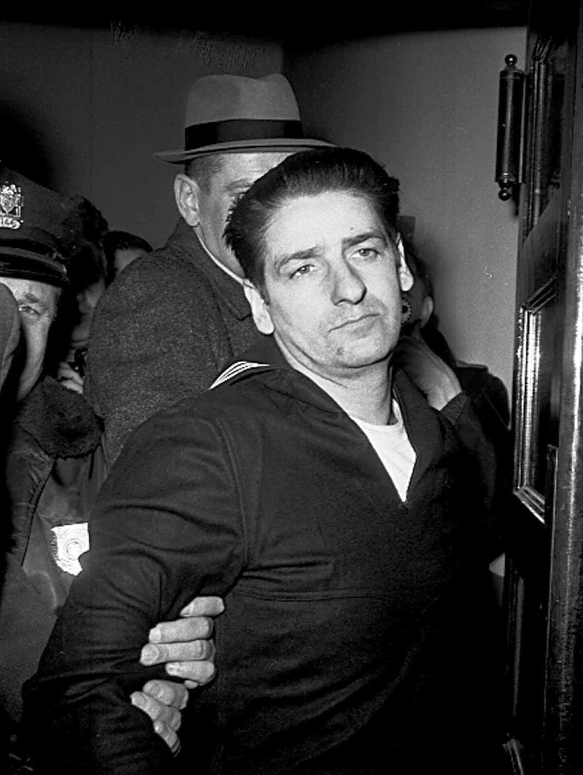 Self-confessed Boston Strangler Albert DeSalvo is seen minutes after his capture in Boston in 1967. Authorities say DNA tests on the remains of DeSalvo confirm he killed Mary Sullivan, the woman believed to be the serial killer's last victim.