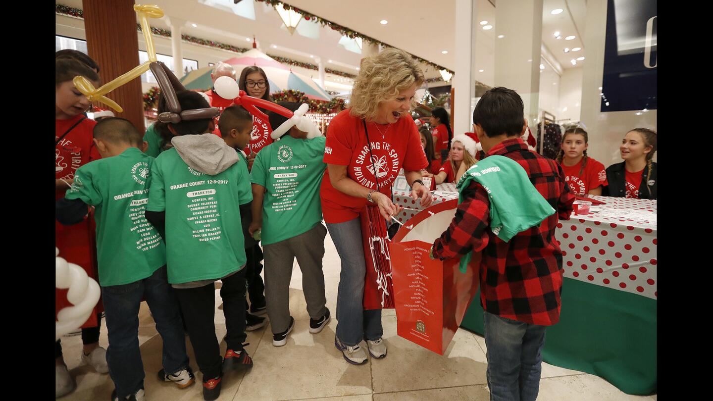 Photo Gallery: Eleventh annual “Sharing the Spirit Holiday Party” at South Coast Plaza