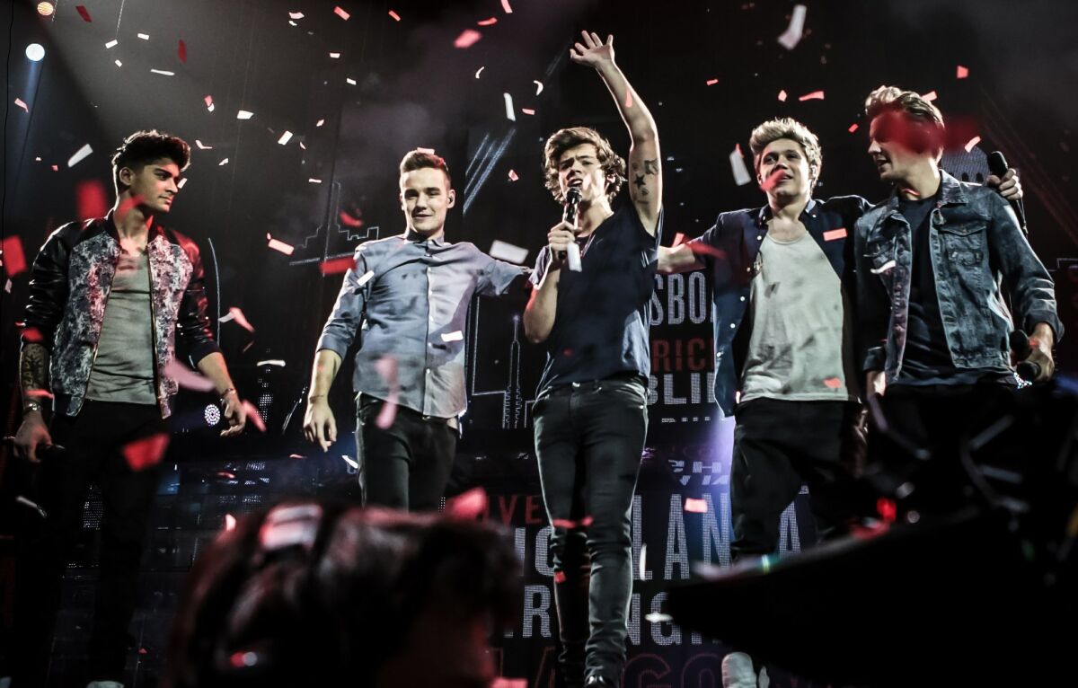 Top teen-pop band One Direction will tour the world in a big way next year,  starting in San Diego. - The San Diego Union-Tribune