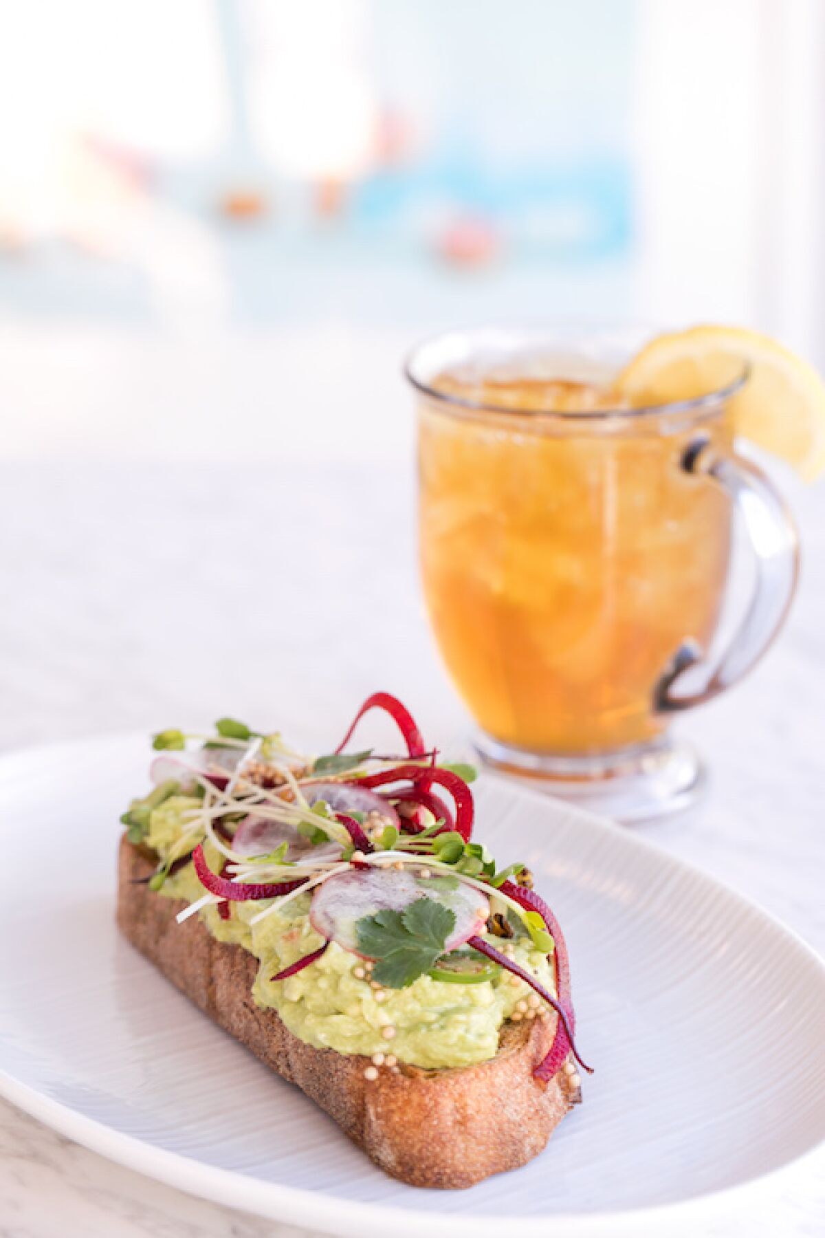Avocado toast and tea at Parakeet Cafe, which will open in Carlsbad this spring.