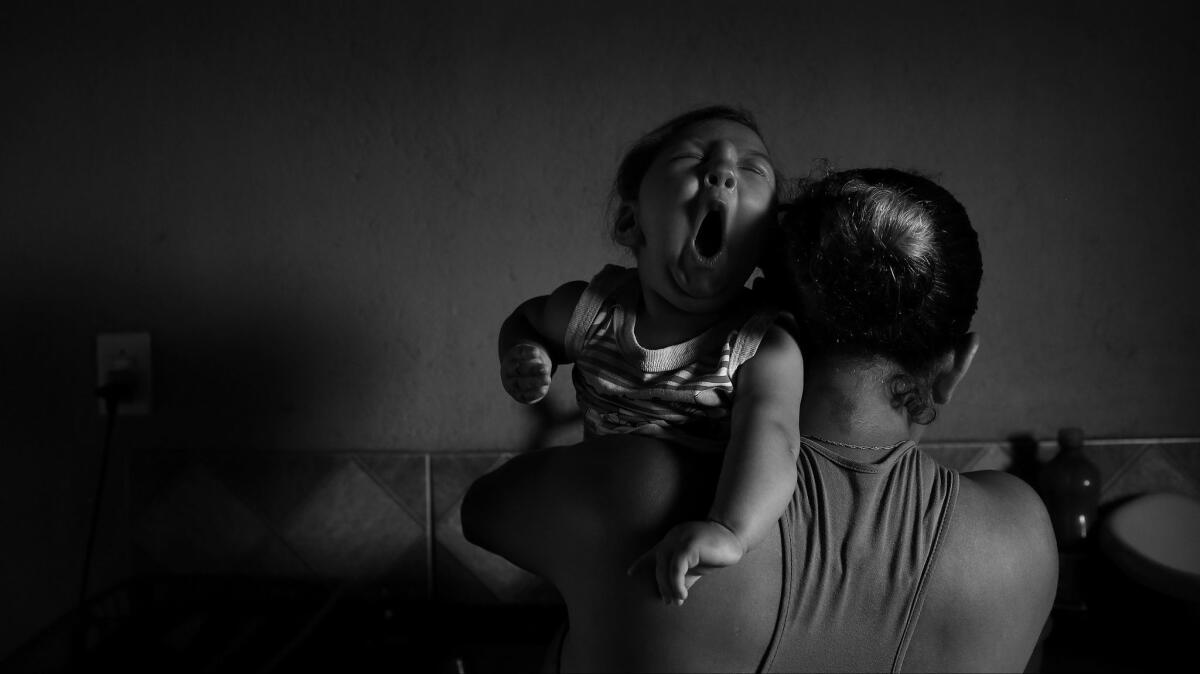 The Times' Katie Falkenberg was a Pulitzer finalist. Seen here: One of her images on families contending with children afflicted with microcephaly.