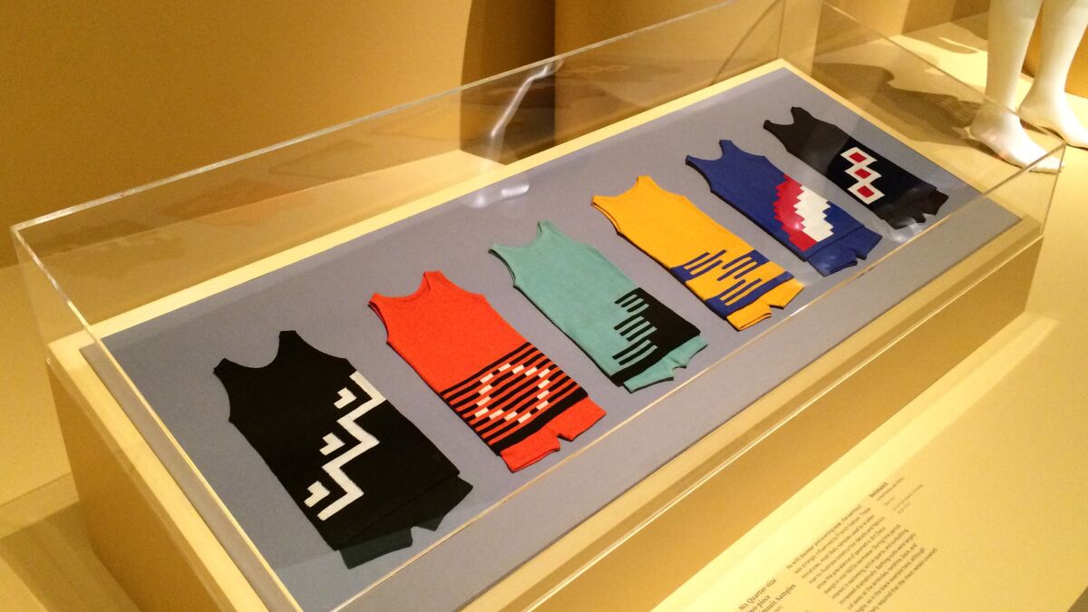 One of my favorite installations in the show features these six quarter-size samples of men's swimsuits from 1920s France, all bearing Deco designs.