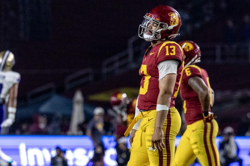 LOS ANGELES, CA - NOVEMBER 4, 2023: USC Trojans quarterback Caleb Williams (13) walks.