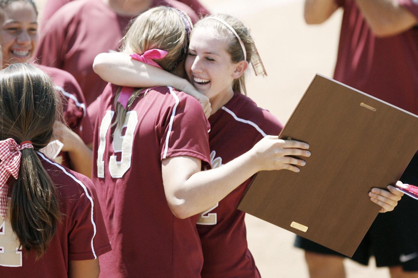 La Canada's Lauren Cox, left, and Catherin Homer, embrace each other after winning the CIF Southern Section Division V championship game against Beumont, which took place at Deanna Manning Stadium in Irvine on Saturday, June 2, 2012.