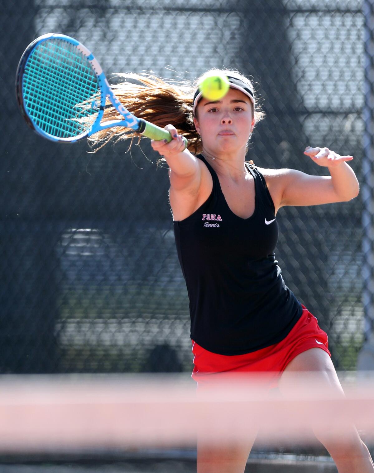 Flintridge Sacred Heart Academy tennis doubles player Hayes Sullivan returns the ball in home game vs. Alemany High School in Sunshine League match at Scholl Canyon Golf & Tennis Club, in Glendale on Tuesday, Oct. 8, 2019.