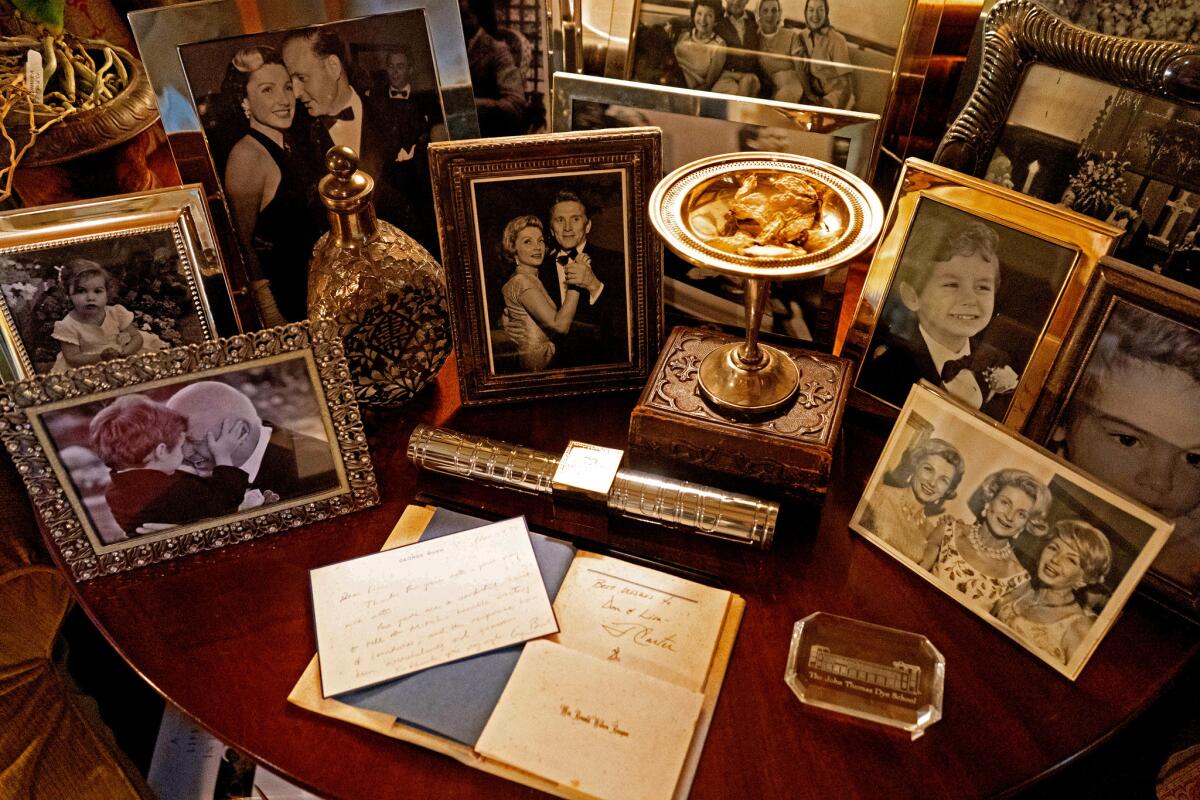The room is a blend of family, career and history. Placed among the many pictures of McRee with her husband, producer Don Granger, and their two children are photographs of her with President Reagan and President Clinton. On display are signed letters from John Hancock and President Eisenhower.