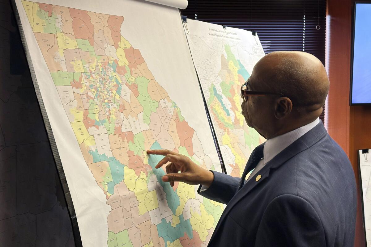 Georgia Rep. Mack Jackson (D-Sandersville) looks at a map of proposed state House districts before a House hearing. 