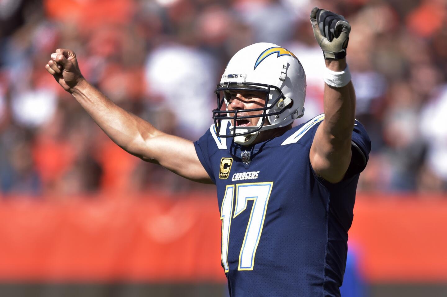 Los Angeles Chargers quarterback Philip Rivers celebrates a touchdown in the first half during an NFL football game against the Los Angeles Chargers, Sunday, Oct. 14, 2018, in Cleveland.