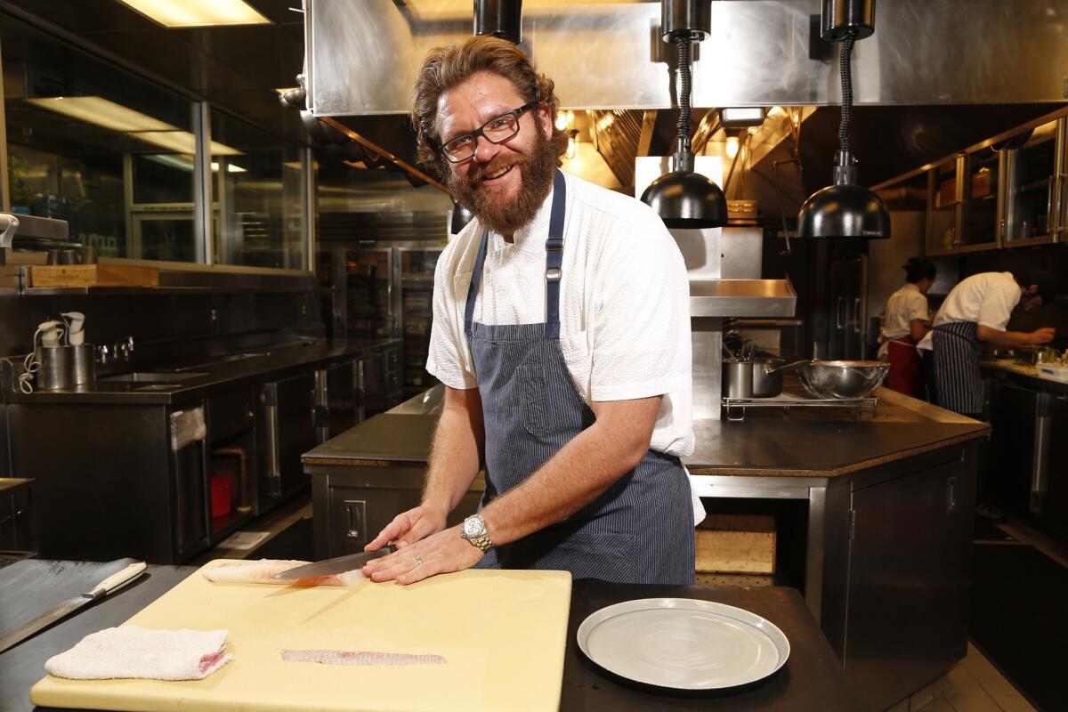 Chef Michael Cimarusti is seen in the kitchen of Providence. Cimarusti is holding a series of guest-chef dinners at Providence through October.