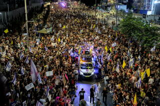 Protesters gather in a demonstration organized by the families of the Israeli hostages taken captive in the Gaza Strip