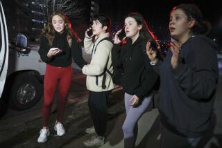 LANSING, MI - FEBRUARY 13: Michigan State University students react during an active shooter situation on campus on February 13, 2023 in Lansing, Michigan. Five people were shot and the gunman still at large following the attack, according to published reports. The reports say some of the victims have life-threatening injuries. (Photo by Bill Pugliano/Getty Images)