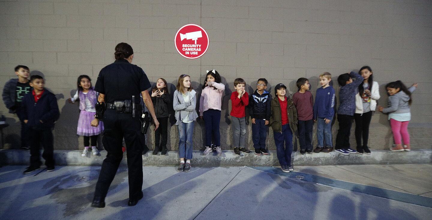 Photo Gallery: Burbank Boys and Girls Club children match up with Burbank Police Department for annual Heroes and Helpers event