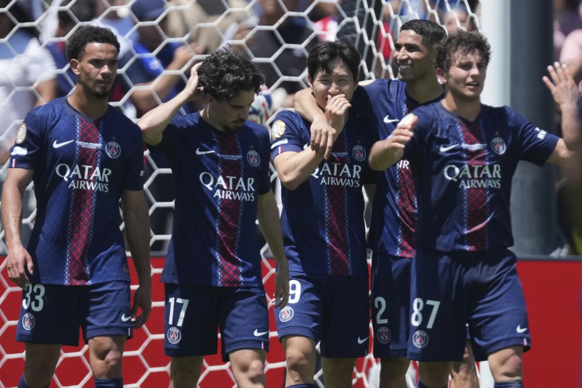 Paris Saint-Germain players celebrate during a 4-0 victory over Atlético Madrid in FIFA Club World Cup.