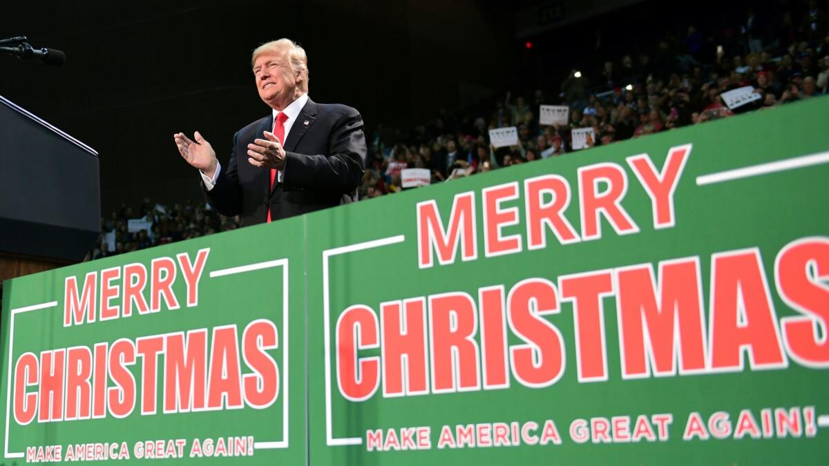 President Trump takes the stage at a campaign-style rally in Pensacola, Fla., on Dec. 8.