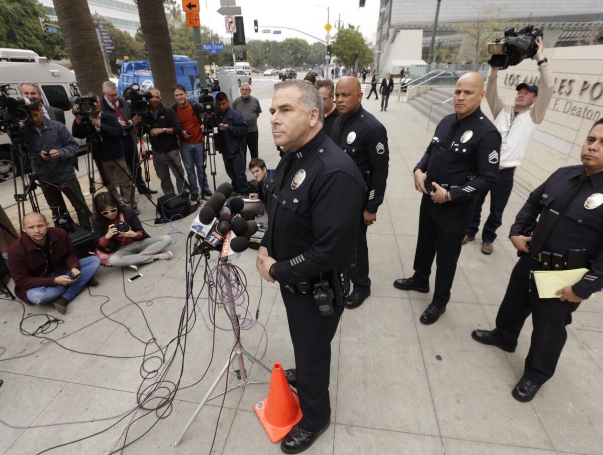 LAPD Capt. Andrew Neiman addresses the media on Friday about the investigation and testing of a knife that was reportedly recovered on property once owned by former football star O.J. Simpson.