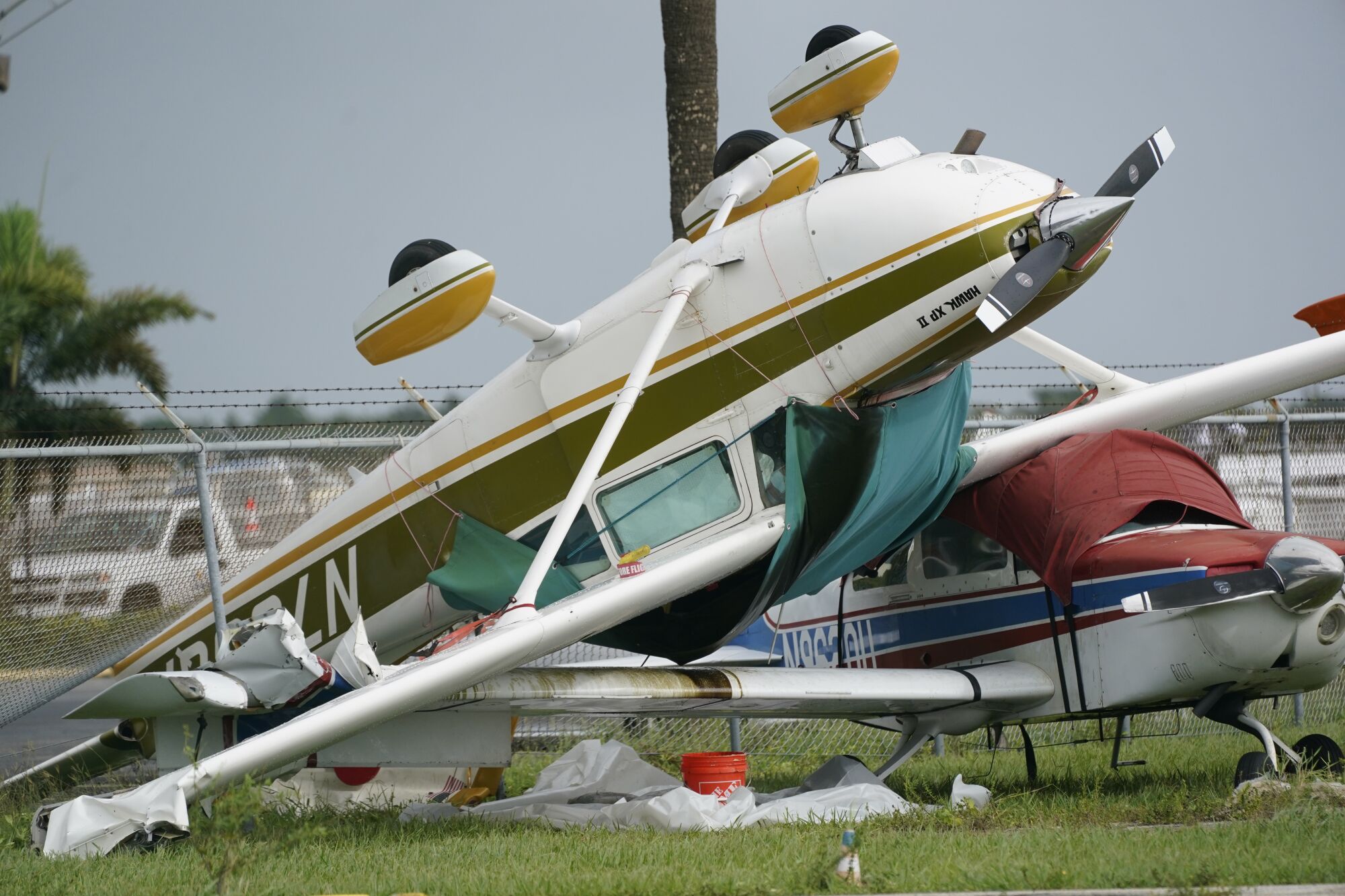 An overturned airplane in Hurricane Ian's aftermath